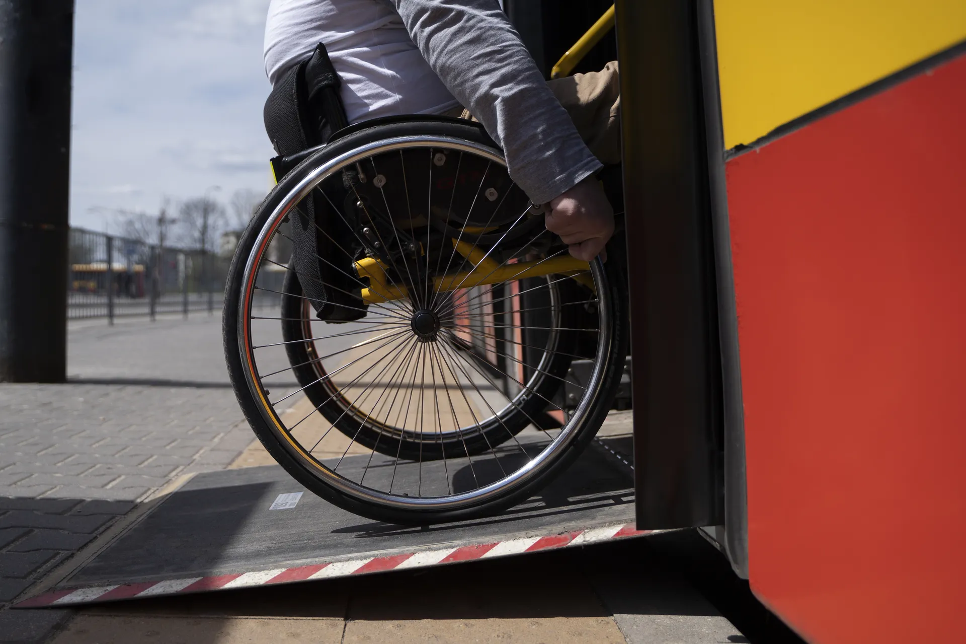 Participant boarding accessible public transport