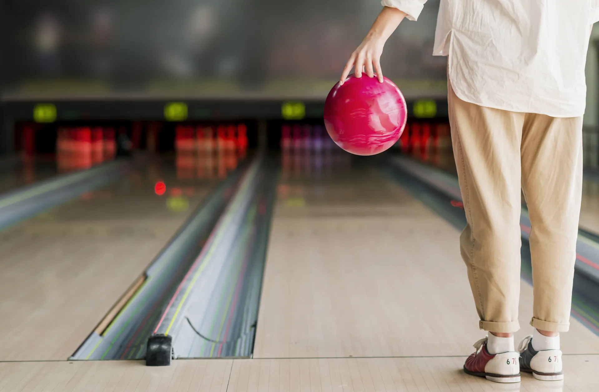 Participant enjoying a bowling outing with community support