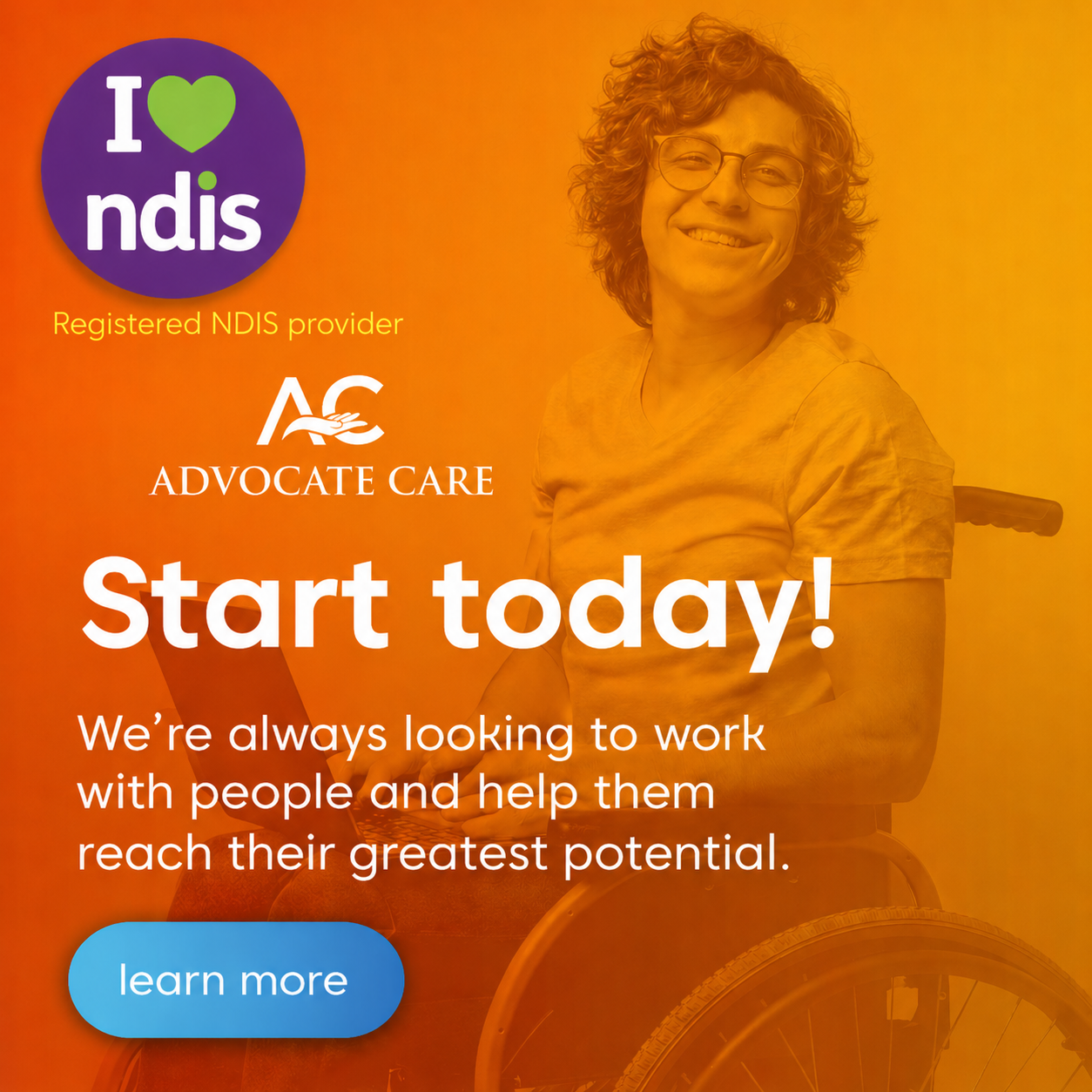 Man in wheelchair with laptop smiling
